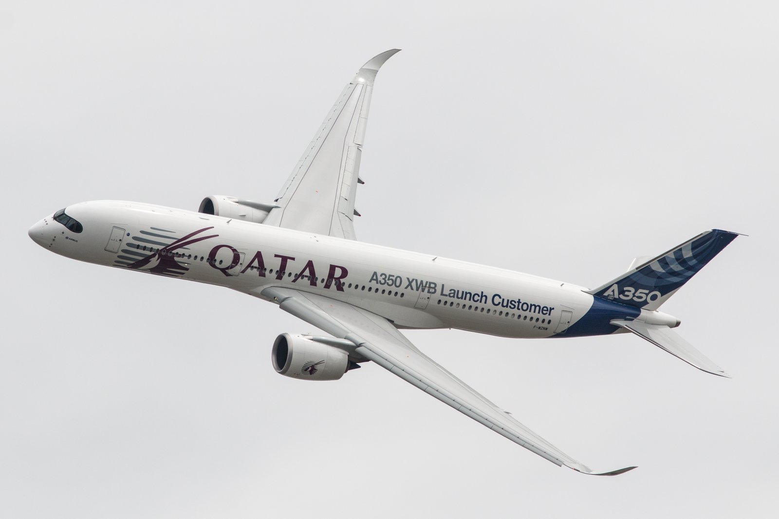 Real photograph of an Airbus A350 cruising at high altitude on an intercontinental oceanic route.
